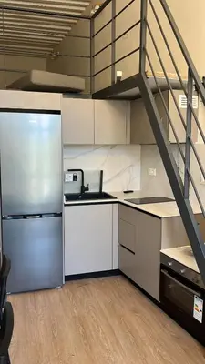 Una cocina o zona de cocina en Apartamento junto a la Plaza del Ayuntamiento