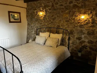 Cama o camas de una habitación en Molino Felix Alojamiento Rurales