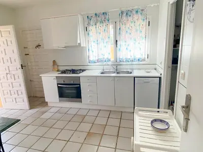 Una cocina o zona de cocina en Villa Anfora Puerto Rey