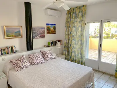 Cama o camas de una habitación en Villa Anfora Puerto Rey