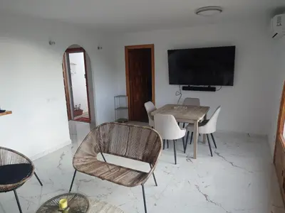 Una televisión o centro de entretenimiento en Apartamento Buena Vista