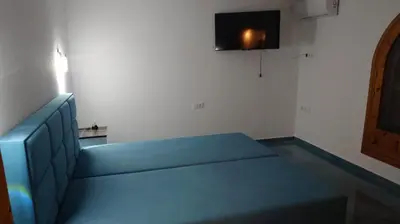 Una televisión o centro de entretenimiento en Apartamento Buena Vista