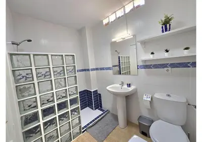 Un baño de El Oficio