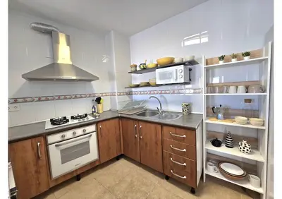 Una cocina o zona de cocina en El Oficio