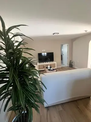 Una televisión o centro de entretenimiento en Villa Amanecer