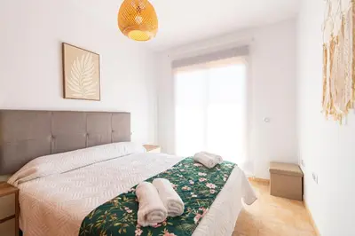 Cama o camas de una habitación en Apartamento con terraza y piscina en Los Collados - By Aloha Palma