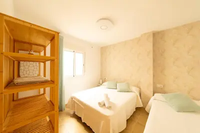 Cama o camas de una habitación en Apartamento Mar de Aqaba