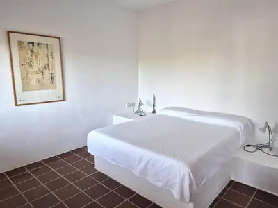 Cama o camas de una habitación en El Palmeral