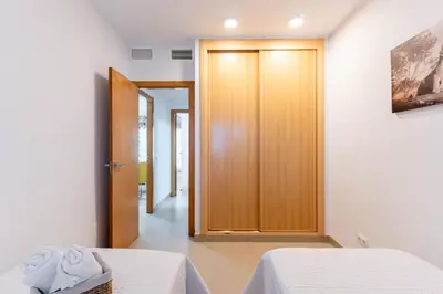 Cama o camas de una habitación en Apartamento Mirador Playa Serena IV R&R