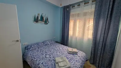 Cama o camas de una habitación en Céntrico apartamento junto al pimiento
