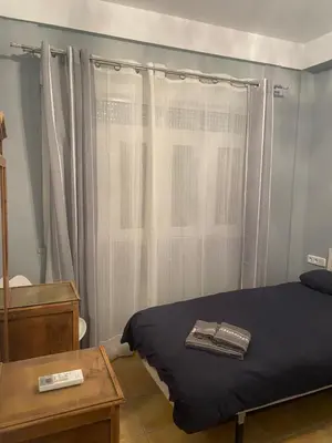 Cama o camas de una habitación en Céntrico apartamento junto al pimiento