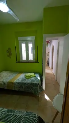 Cama o camas de una habitación en Céntrico apartamento junto al pimiento