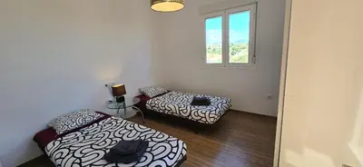 Cama o camas de una habitación en VILLA con piscina privada, a 35 km de las playas, vistas a la montaña, WIFI