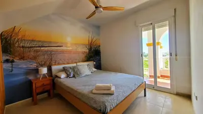 Cama o camas de una habitación en Ático Sol y Mar Vera