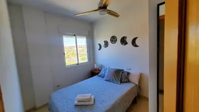 Cama o camas de una habitación en Ático Sol y Mar Vera
