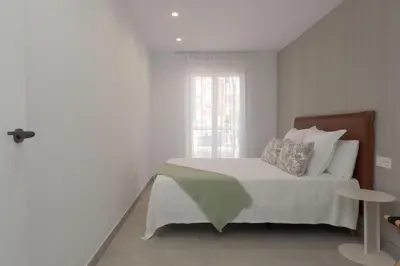 Cama o camas de una habitación en Apartamento Exclusivo Frente al Mar