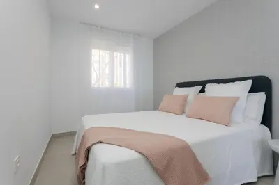 Cama o camas de una habitación en Apartamento Exclusivo Frente al Mar