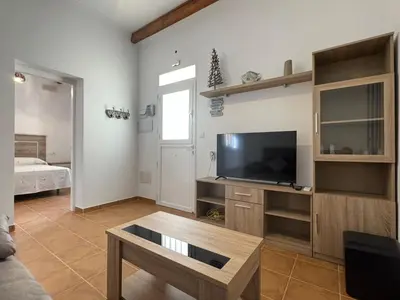 Una televisión o centro de entretenimiento en Casa Velarde - Garrucha