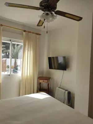 Una televisión o centro de entretenimiento en Apartamento VeraPinar