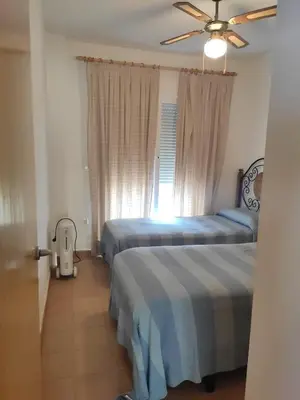 Cama o camas de una habitación en Apartamento VeraPinar