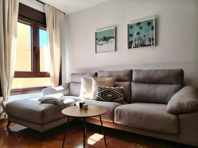 Zona de estar de Paseo de Almería Suites en pleno centro de Almería, 2 Hab