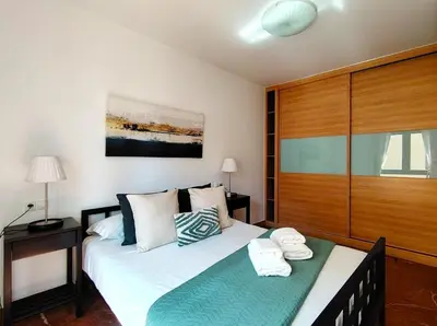 Cama o camas de una habitación en Paseo de Almería Suites en pleno centro de Almería, 2 Hab