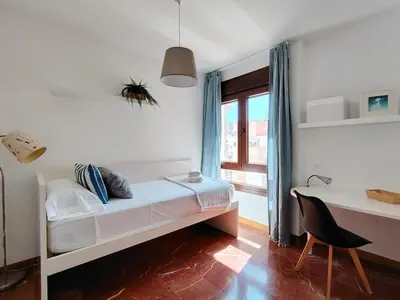 Cama o camas de una habitación en Paseo de Almería Suites en pleno centro de Almería, 2 Hab