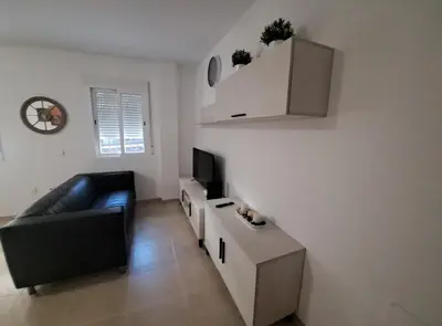 Una televisión o centro de entretenimiento en Apartamento calle Senado