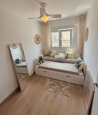 Cama o camas de una habitación en ATICO 4 con Terraza en Centro, Casco Histórico con Aire Acondicionado y Wifi