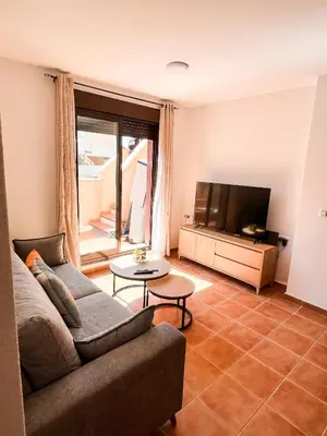 Zona de estar de Apartamento con acogedora terraza