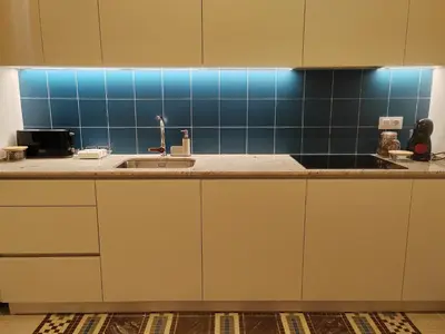 Una cocina o zona de cocina en Apartamentos Bertrand Plaza
