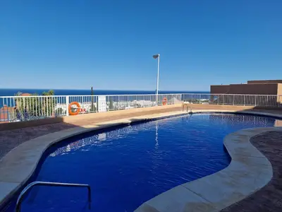 Piscina en o cerca de Atico con vistas al mar