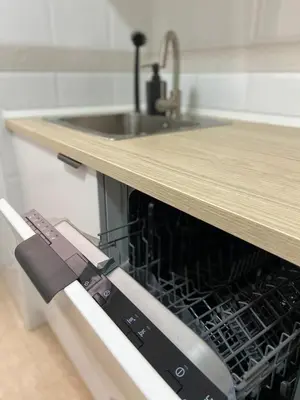 Una cocina o zona de cocina en Apartamento a 2 min de la playa - 3 dormitorios - WIFI - Totalmente equipado