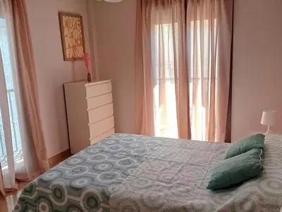 Cama o camas de una habitación en Piso 'Esquina del Molino'