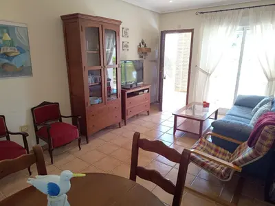 Una televisión o centro de entretenimiento en Bonito y cómodo apartamento