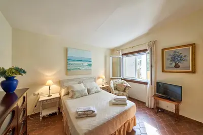 Cama o camas de una habitación en El Palomar