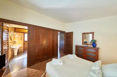 Cama o camas de una habitación en El Palomar