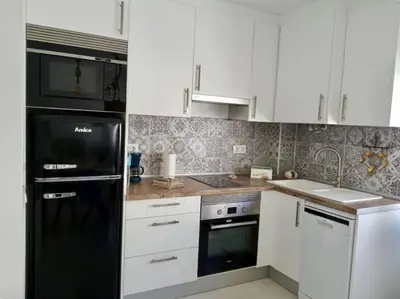 Una cocina o zona de cocina en Casa del Parque