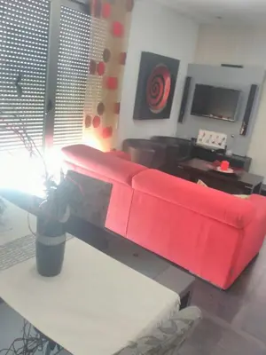 Zona de estar de ATICO con 30m2 de terraza y vistas al mar
