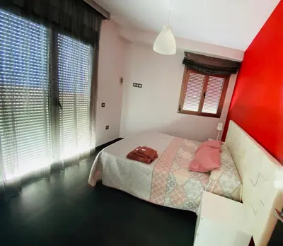 Cama o camas de una habitación en ATICO con 30m2 de terraza y vistas al mar