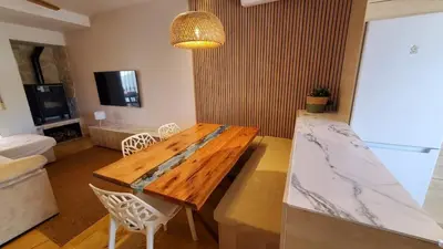 Una televisión o centro de entretenimiento en Casa Indi Vera