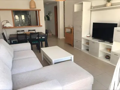 Una televisión o centro de entretenimiento en 2 bedroom apartment in the Oasis complex