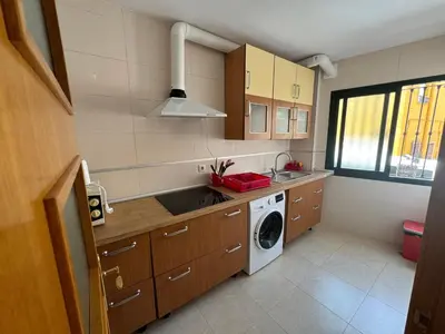 Una cocina o zona de cocina en apartamento vacacional roquetas de mar