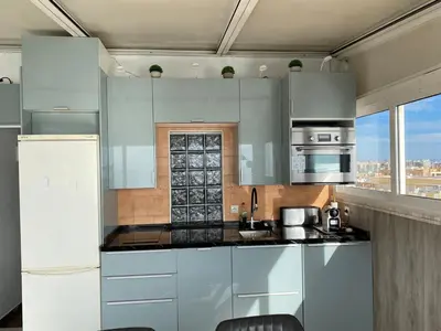 Una cocina o zona de cocina en Apartamento-sobreático 1 linea de playa