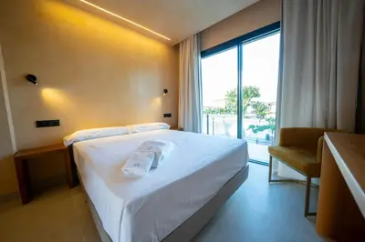Cama o camas de una habitación en Hotel Boutique MANANTIAL DE CELA