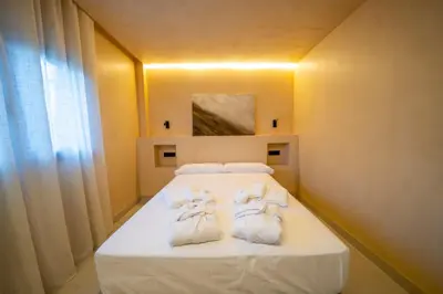 Cama o camas de una habitación en Hotel Boutique MANANTIAL DE CELA