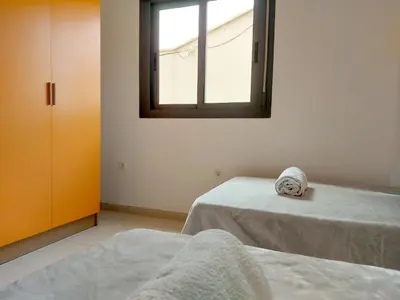 Cama o camas de una habitación en Ático Alborania I con gran terraza, aparcamiento, vistas al valle, entre el mar y el desierto