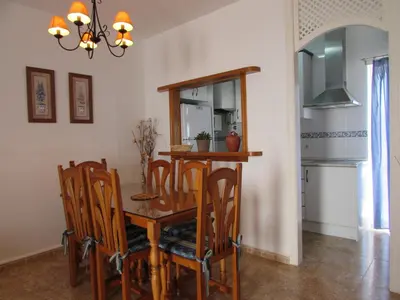 Una cocina o zona de cocina en VERA PLAYA CON PISCINA, TERRAZA y SOLARIUM