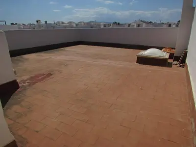 Un balcón o terraza de VERA PLAYA CON PISCINA, TERRAZA y SOLARIUM