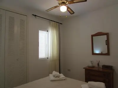 Cama o camas de una habitación en VERA PLAYA CON PISCINA, TERRAZA y SOLARIUM